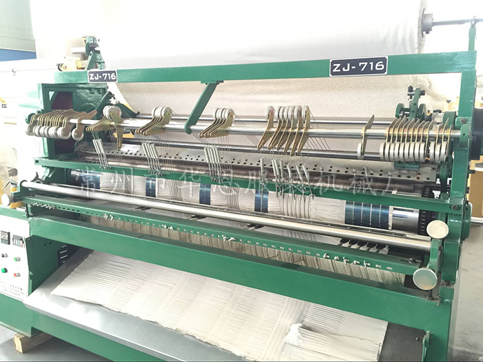 浅析压摺机在纺织行业的应用